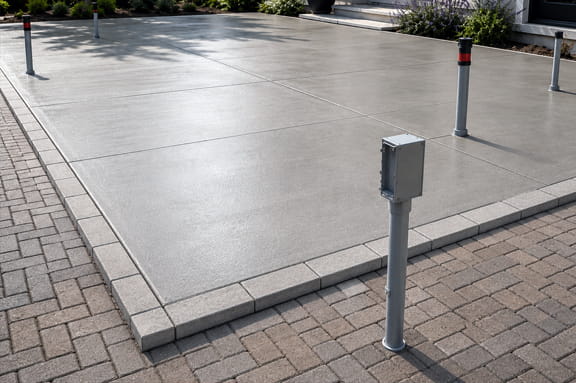 Concrete patio poured after underground electrical conduit installation in the Oakland Hills.